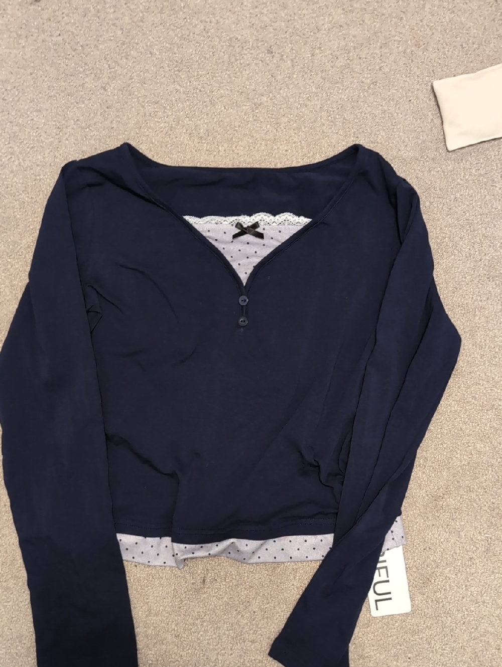 Women's Navy Long-Sleeve Henley with Layered Polka-Dot Hem